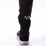 Stay Strong Pantalones de carrera V2 - Negro/Blanco