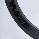 Stay Strong Race DVSN Carbon Expert Race Rand - Front